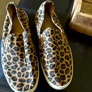 Leopard slip on shoes.